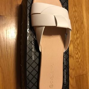 New in box, two pair City Chic Spark Slides. size 11 (43). never worn